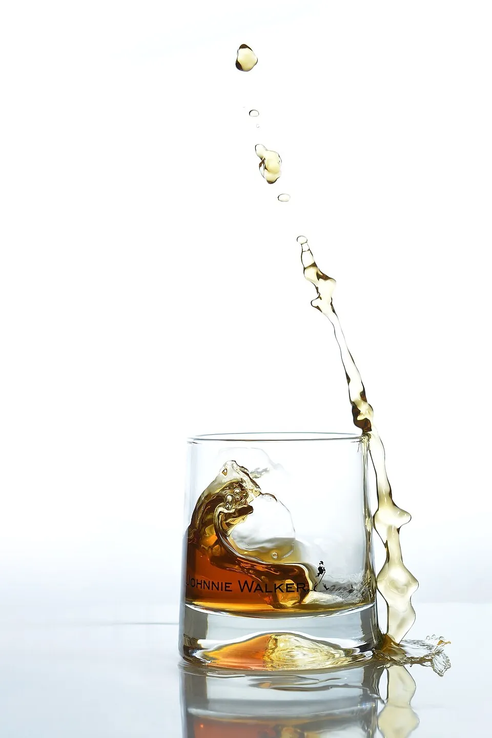 Chronophotograph at high speed. Johnnie Walker splash without any montage! Glass was glued to an inclined plane, which was dropped to create the splas